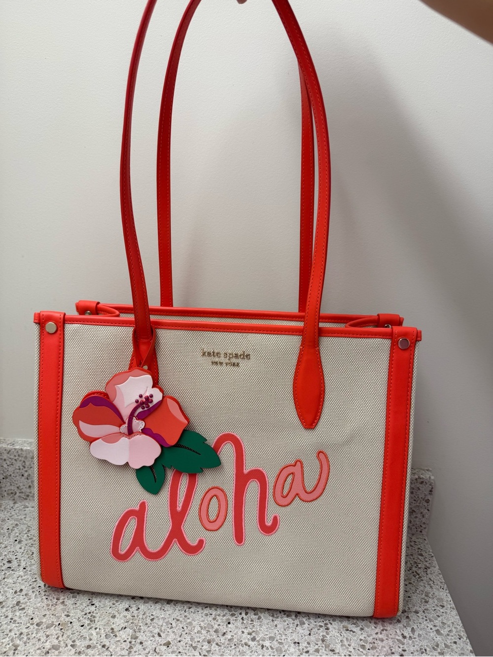 Hawaii Exclusive Kate spade cream canvas tote with coral trim and pink appliqueu